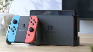 Nintendo Switch OLED Red &amp; Blue sarkans zils