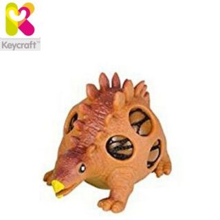 - KeyCraft NV356 Gooey Anti Stress Dinosaurs tīklā ar &amp;amp;#353;ķidrumu 10cm bērniem 3+ gadiem Brūns
